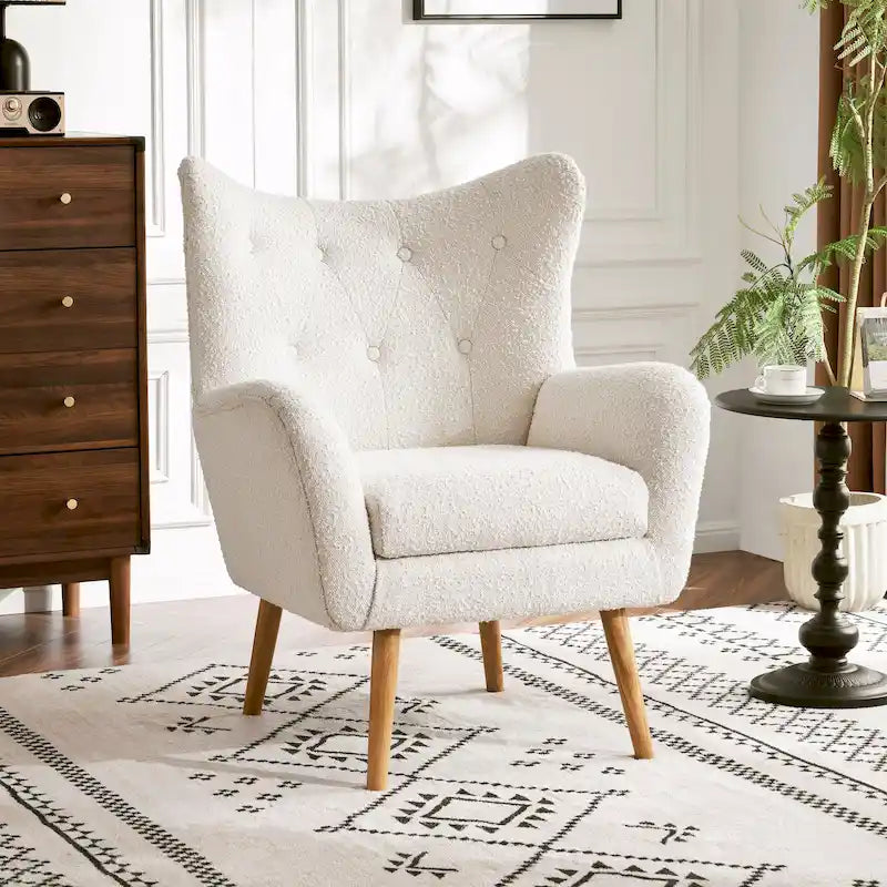 Fauteuil club à oreilles en boucle Amande, une place