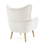 Fauteuil club à oreilles en boucle Amande, une place