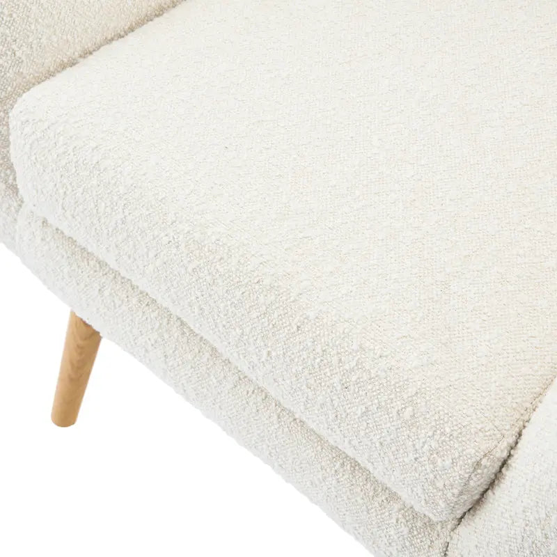 Fauteuil club à oreilles en boucle Amande, une place