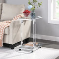 Table d'appoint contemporaine en forme de C Grondin avec plateau en verre trempé, structure en acier et acrylique, roulettes verrouillables