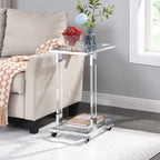 Table d'appoint contemporaine en forme de C Grondin avec plateau en verre trempé, structure en acier et acrylique, roulettes verrouillables