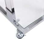 Table d'appoint contemporaine en forme de C Grondin avec plateau en verre trempé, structure en acier et acrylique, roulettes verrouillables